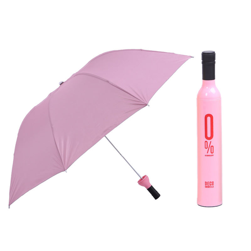 Three folding wine bottle umbrella opened, demonstrating coverage