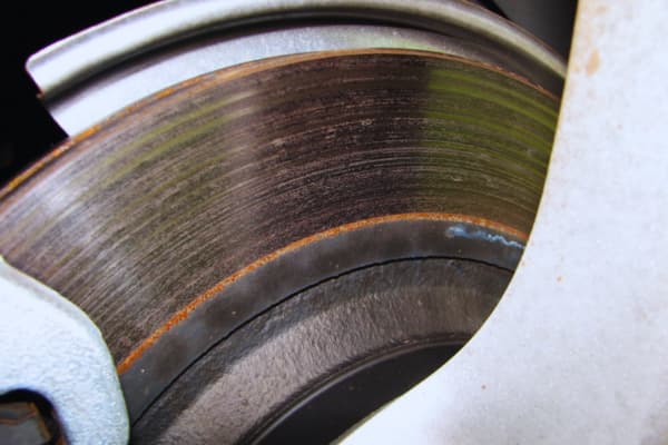 Rotor damage caused by ignoring when to replace brake pads minimum safe thickness