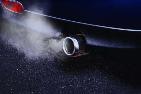 White exhaust smoke as a common symptom of a blown head gasket