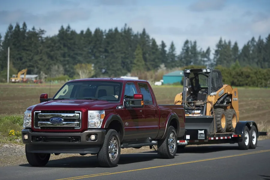 What is the normal engine oil temperature under heavy towing and load conditions