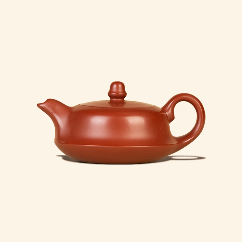 The Yixing Zisha Moonpot Quhu Teapot, made from authentic original Kuang Zhuni clay, is a handmade small teapot (200ml) for brewing tea, ideal for home use and gifting as a standalone tea set piece.