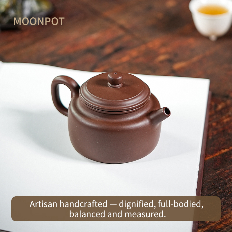 Yixing Purple Clay Moonpots — Shuiping Teapot. Crafted from raw Zhuni clay, capturing the beauty of an antique Qing Dynasty original. 150ml.