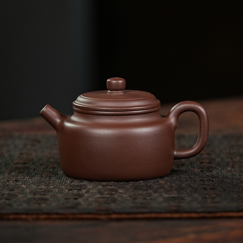 Yixing Purple Clay Moonpots — Shuiping Teapot. Crafted from raw Zhuni clay, capturing the beauty of an antique Qing Dynasty original. 150ml.