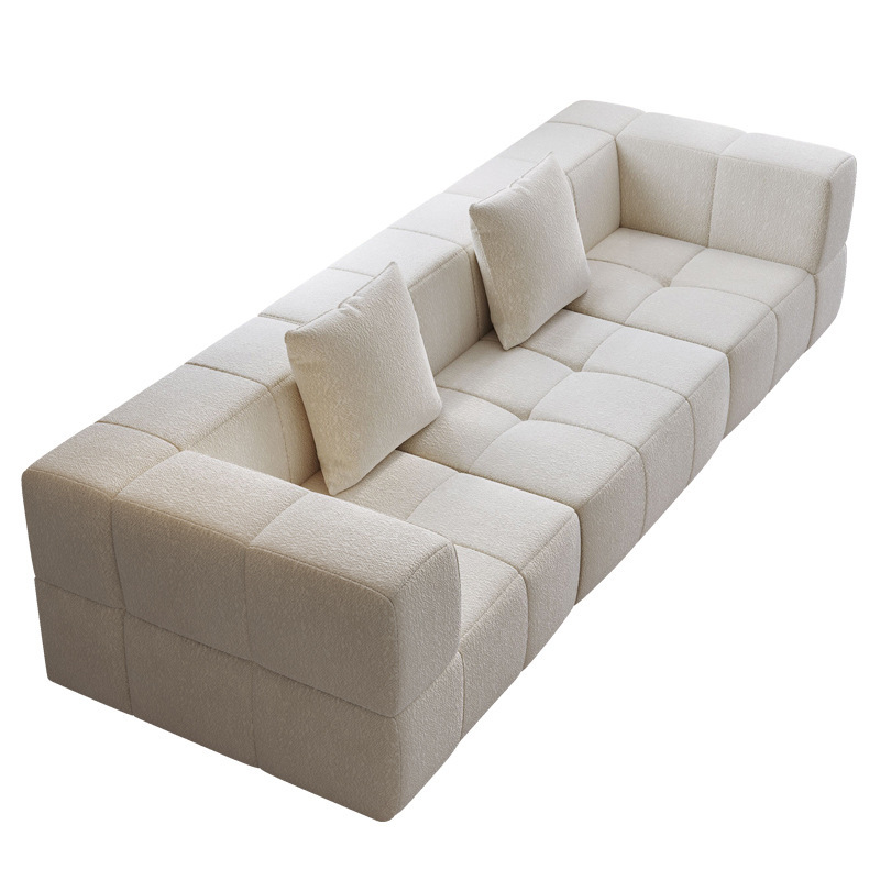 Sofá esquinero reclinable de tela de cuero nórdico simple fabricado en China, con sistema de compresión al vacío, ideal para comedor. Cama de terciopelo Teddy color crema con diseño de bloques de algodón de azúcar.