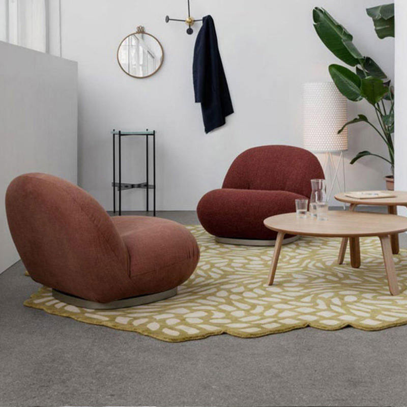Unique Shaped Lounge Chair With Molded Cotton Body and Matte Black Metal Base China Factory
