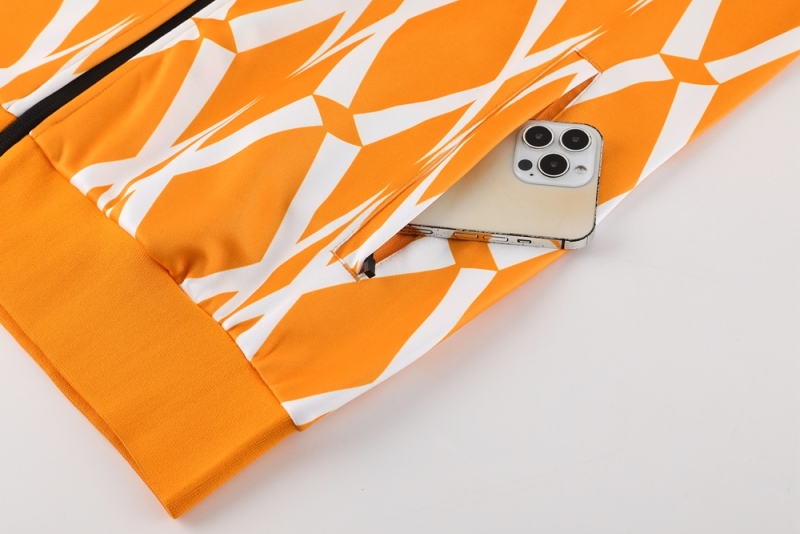 23-24 Ivory Coast 01 Orange Jacket Suit
