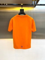 GXZ Men's Orange Short-Sleeve Embossed Logo T-Shirt – Bold Fashion for Casual and Urban Wear