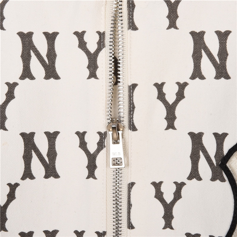 Make a Statement with the GXZ All-Over Printed Varsity Jacket
