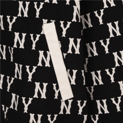 Make a Statement with the GXZ All-Over Printed Varsity Jacket