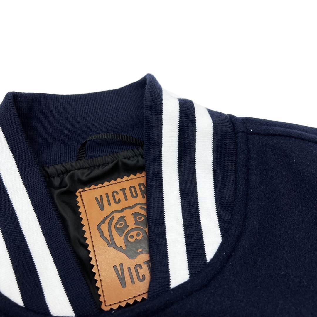 Step into Iconic Style with the GXZ Two-Tone Varsity Jacket