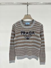 Timeless Elegance: GXZ Striped Knit Sweater with Embroidered Logo