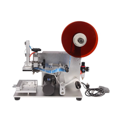 Semi-automatic flat labeling machine