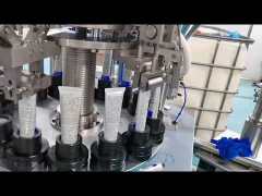 Aluminum tube filling and sealing machine