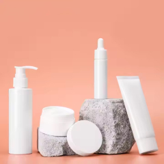 Empty lotion pump bottle with toner bottle