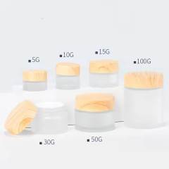 frosted glass cosmetic jar with wooden grain lid
