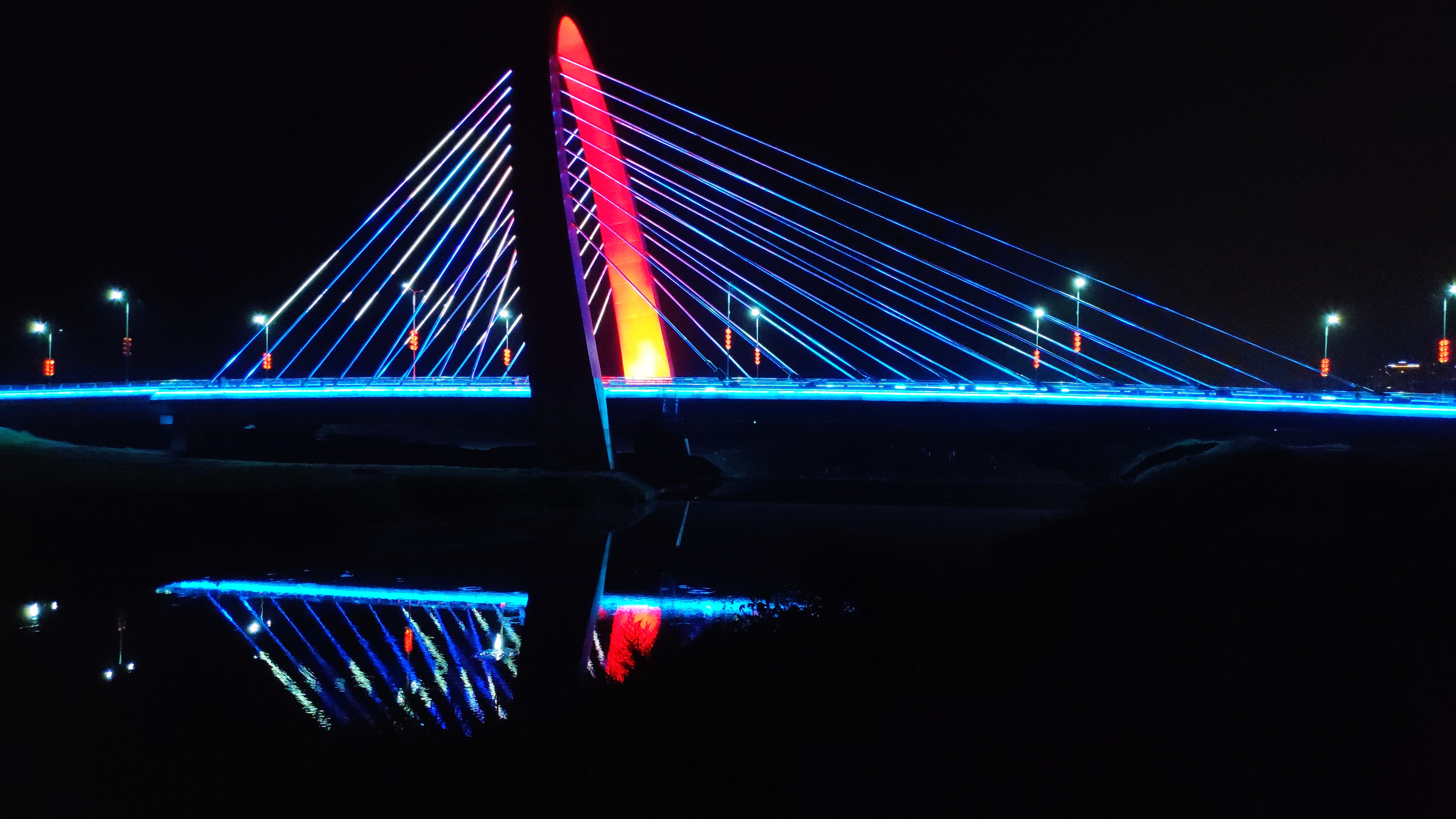 RGB LED lit landmark cable-stayed arch bridge