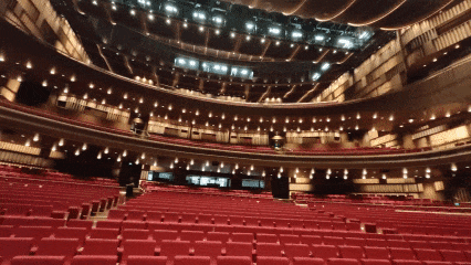 Multi-tier red seating inside New Bund 31 grand theatre