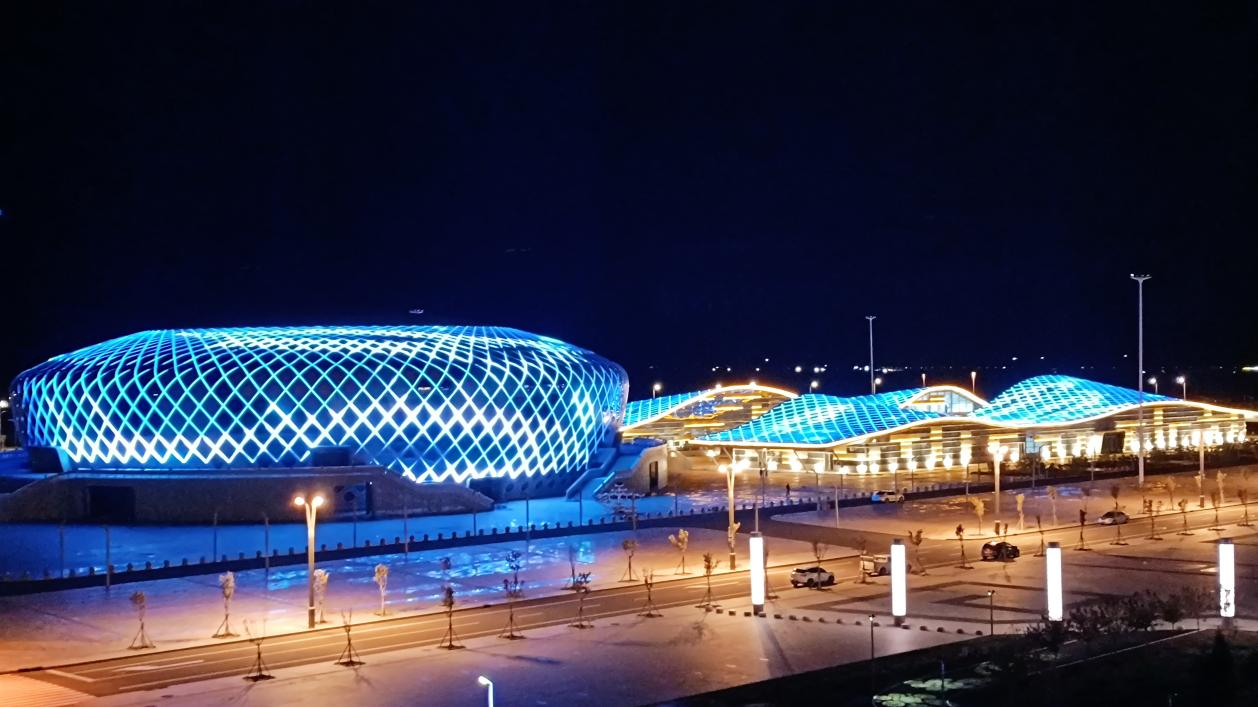 Modern stadium facade lighting project with animated LED effects.