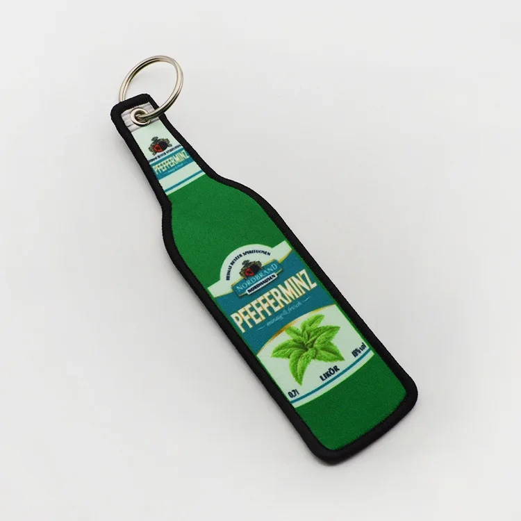 Luggage Clothing Fabric Hang Tag Custom Keyring China Embossed Embroidered Keychain Embroidery