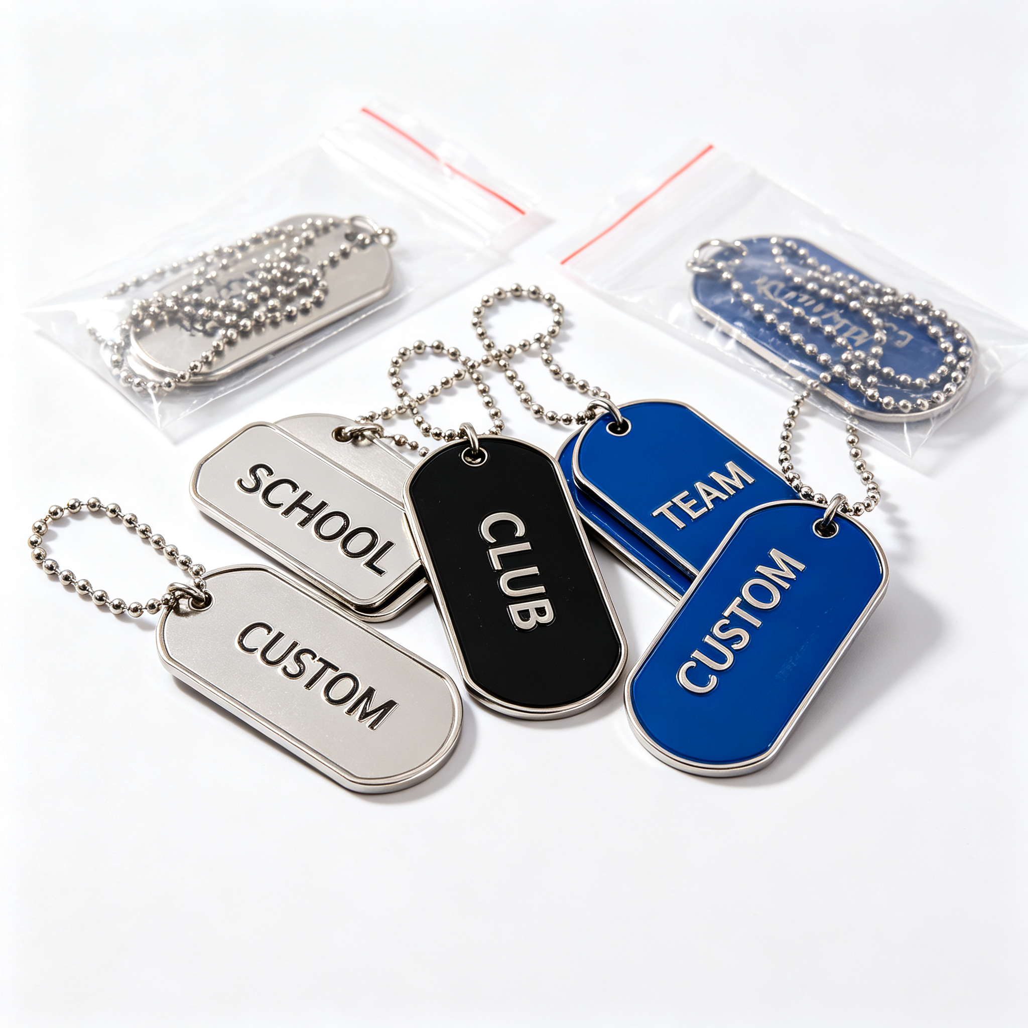 School club team embossed metal dog tags in silver black and blue