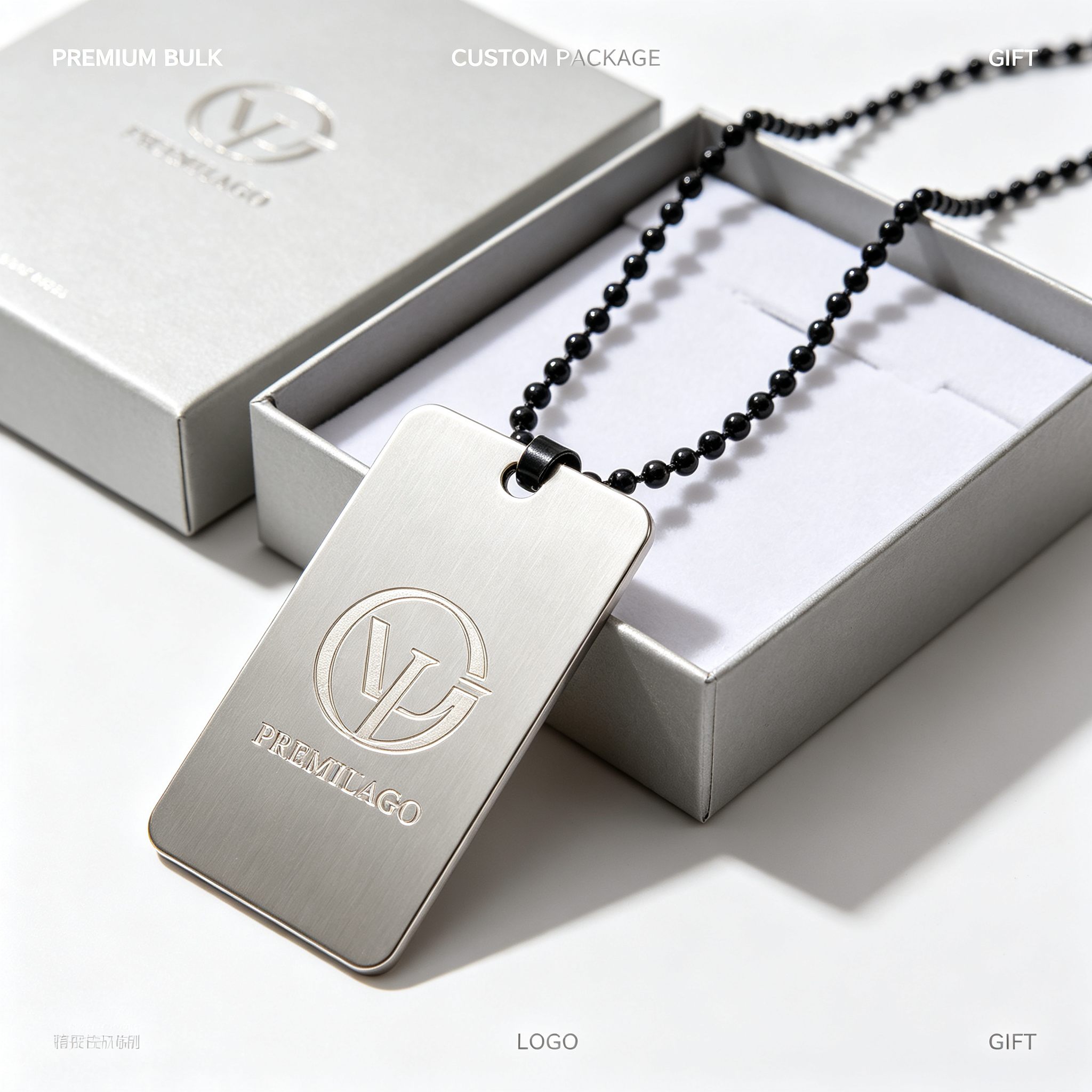 Brushed silver brand logo dog tag with black bead chain and gift box