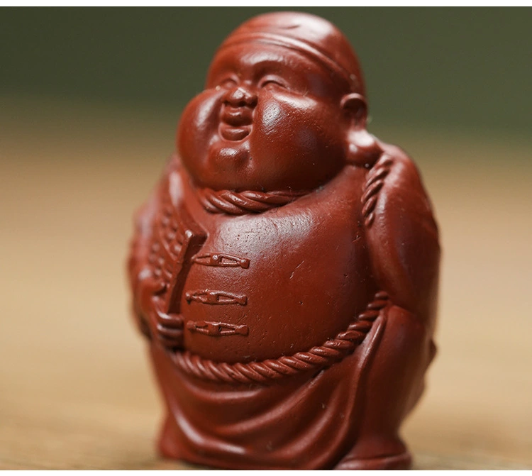 Made of purple clay, it is a collectible for tea - drinking occasions. The figurines of the God of Longevity and the God of Wealth can bring health, longevity and wealth.