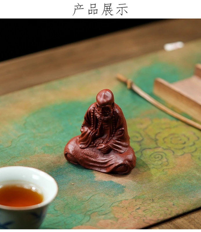 Made of purple clay, it is a collectible for tea - drinking occasions. The figurines of the God of Longevity and the God of Wealth can bring health, longevity and wealth.