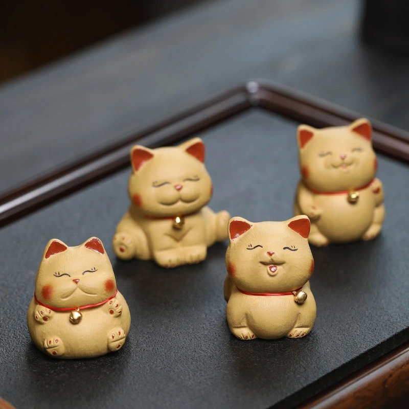 Handmade original purple clay Maneki - Neko ornaments for attracting wealth.