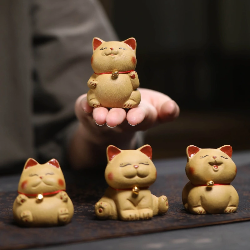 Handmade original purple clay Maneki - Neko ornaments for attracting wealth.