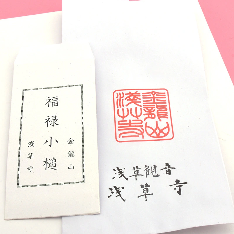 The amulet from Sensoji Temple, a hammer that can bring good luck.