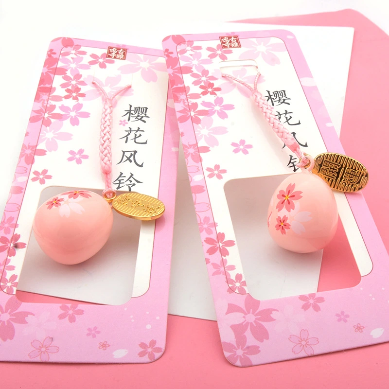 Praying for blessings in Japanese temples.Cherry blossom wind chimes that bring love and good luck.
