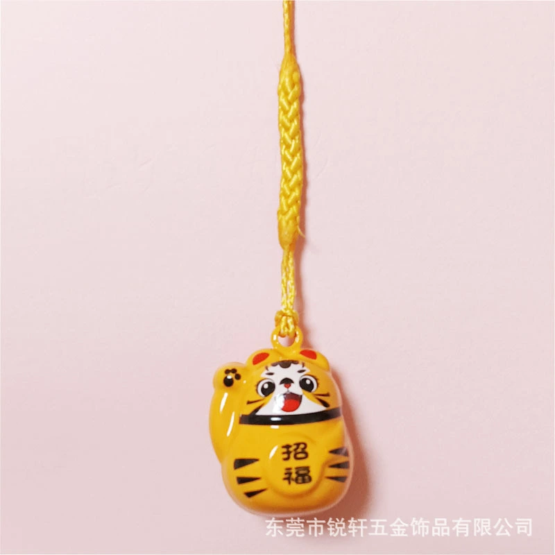 The Maneki-neko Water Sound Bell Omamori for Good Luck and Wealth Attraction from Sensoji Temple in Japan. (Here, "Maneki-neko" is the Japanese name for the beckoning cat, which is often associated with attracting good fortune and wealth in Japanese cultu