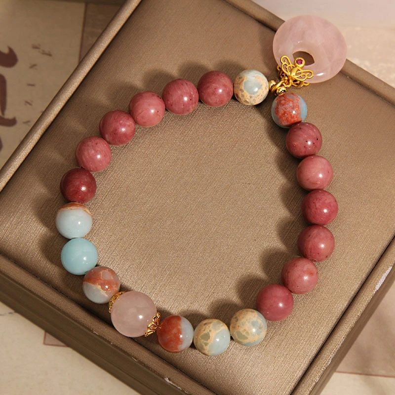 The natural rhodonite raw stones can bring love, stabilize emotions, enhance interpersonal relationships and relieve anxiety.