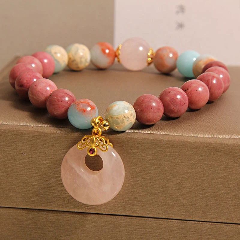 The natural rhodonite raw stones can bring love, stabilize emotions, enhance interpersonal relationships and relieve anxiety.