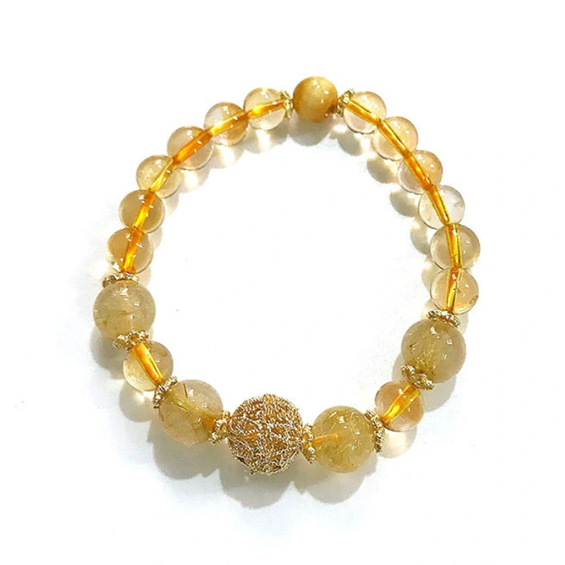 The natural yellow crystal bead bracelet can attract and preserve wealth, open up wisdom and make life full of sunshine.