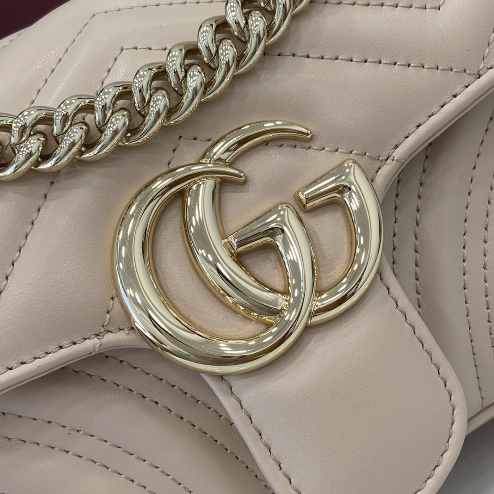 GG Marmont Collection Quilted Mini Handbag.