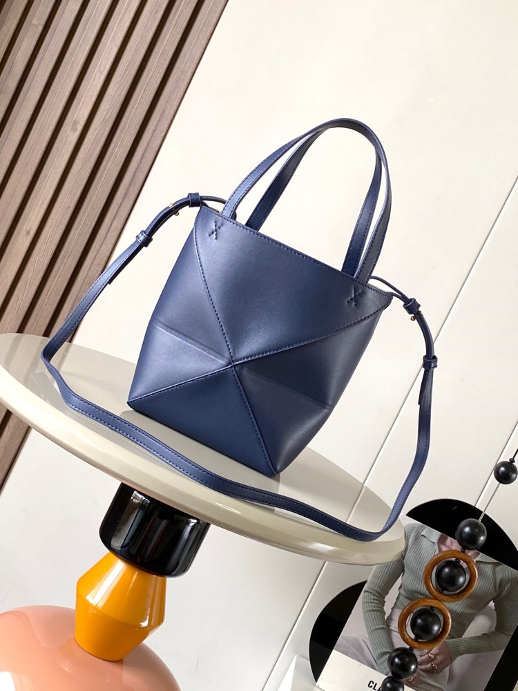 The new Puzzle Fold bag in shiny cowhide leather