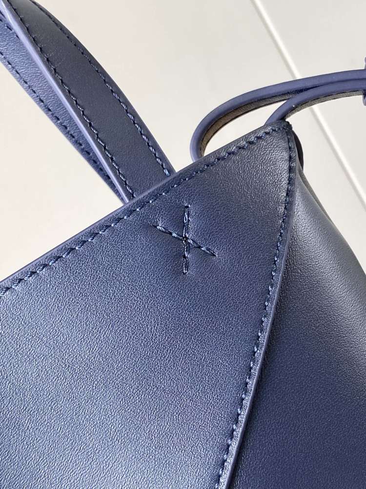 The new Puzzle Fold bag in shiny cowhide leather