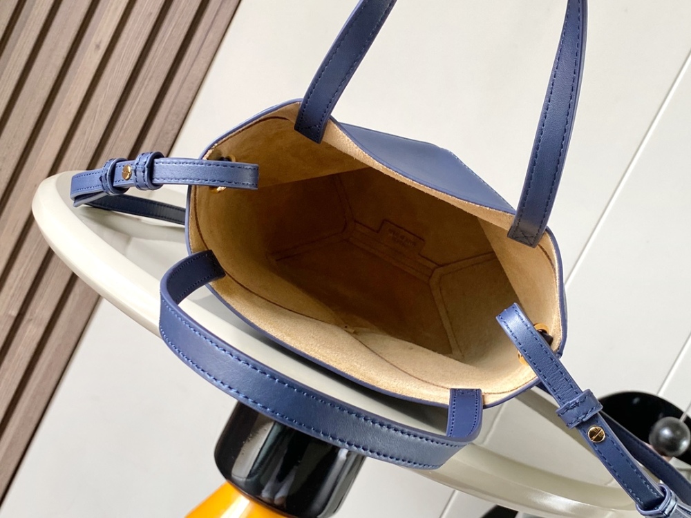 The new Puzzle Fold bag in shiny cowhide leather