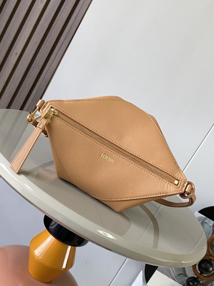 New Puzzle Fold bag reinterpreted as a practical and versatile clutch bag.