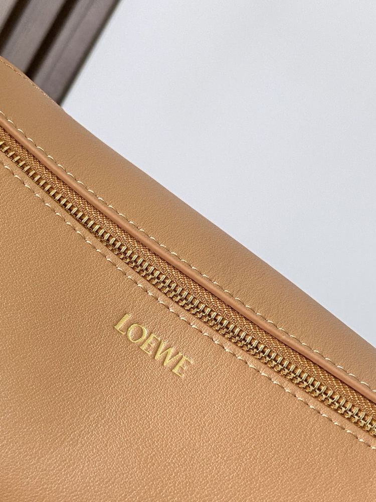 New Puzzle Fold bag reinterpreted as a practical and versatile clutch bag.
