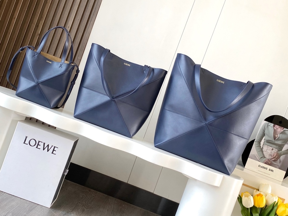 The new Puzzle Fold bag in shiny cowhide leather