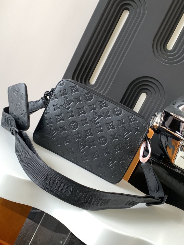 Embossed shoulder bag
