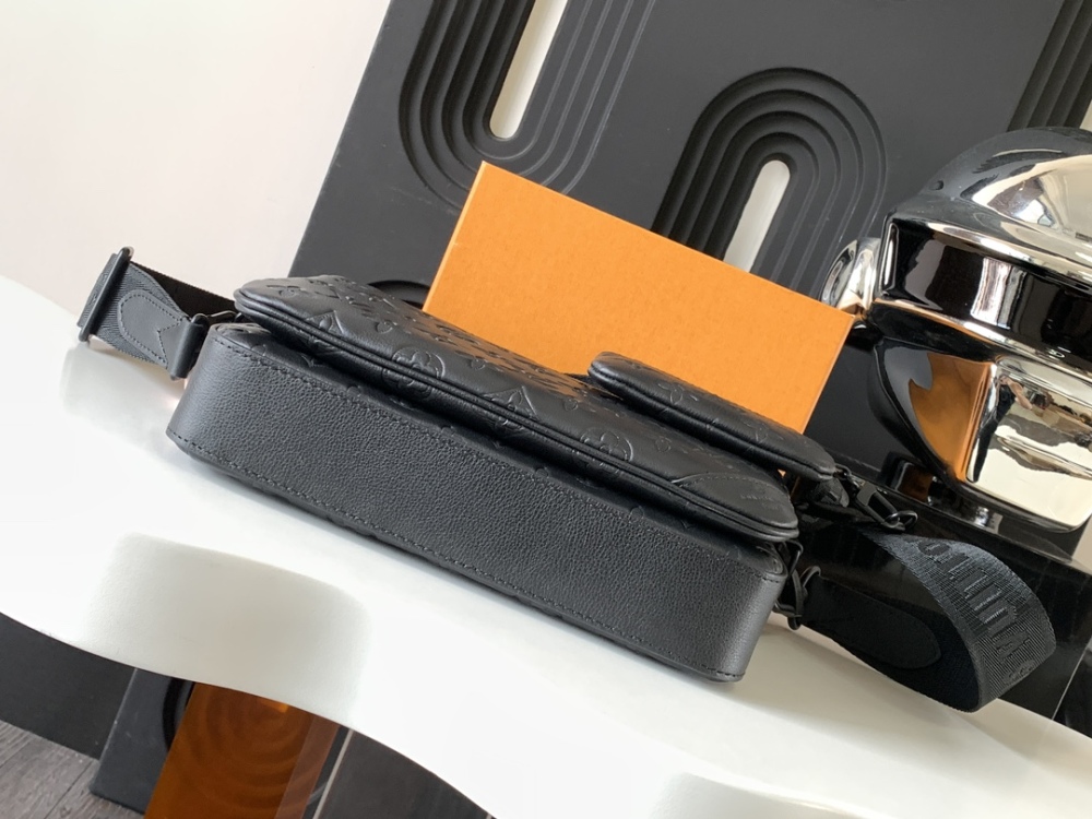 Embossed shoulder bag