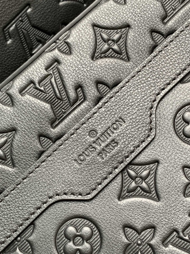 Embossed shoulder bag