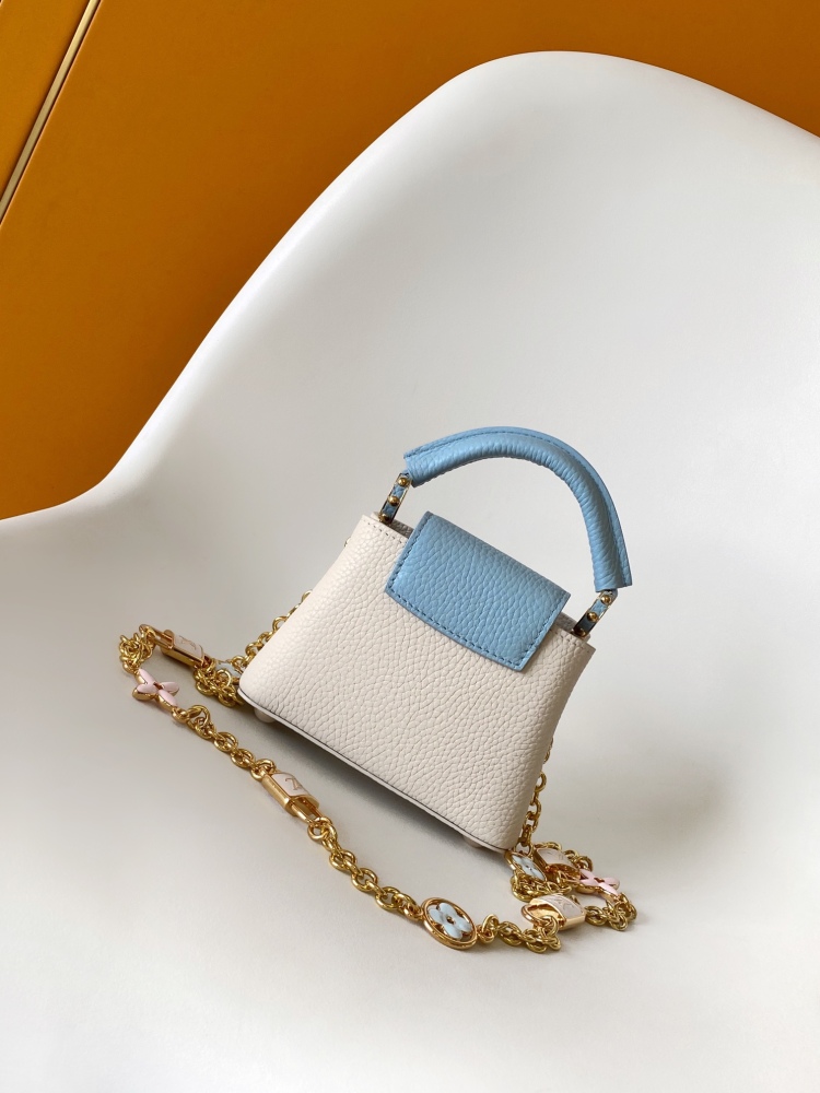 This Capucines mini bag is made of Taurillon leather with a gorgeous Lovelock chain.