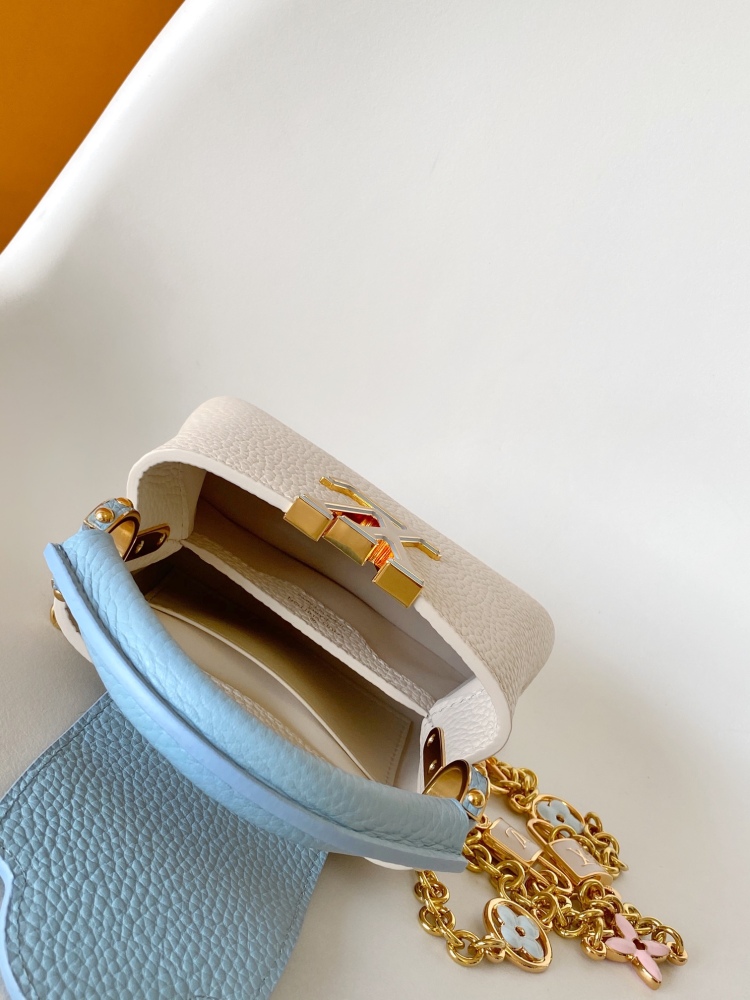 This Capucines mini bag is made of Taurillon leather with a gorgeous Lovelock chain.