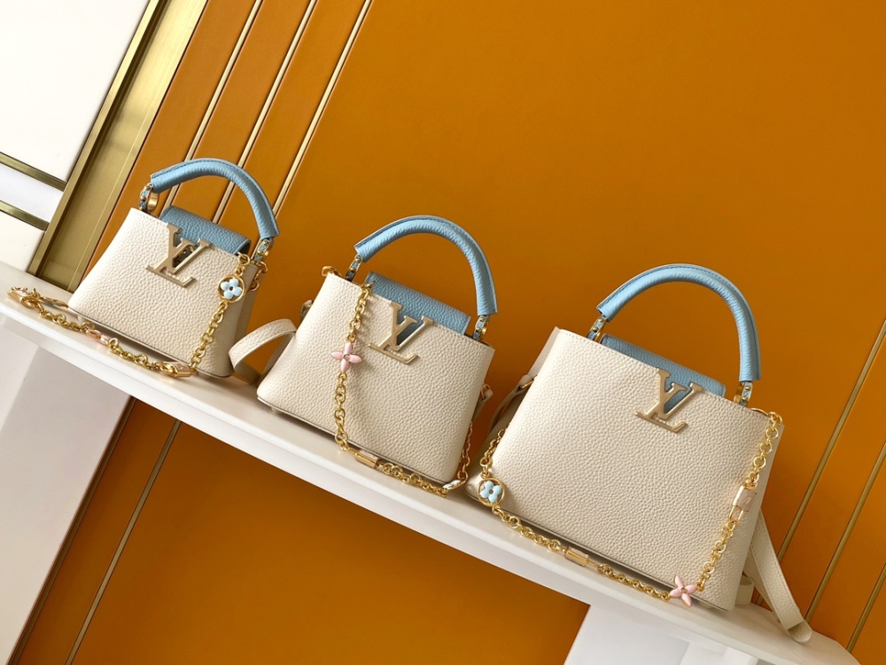 This Capucines mini bag is made of Taurillon leather with a gorgeous Lovelock chain.