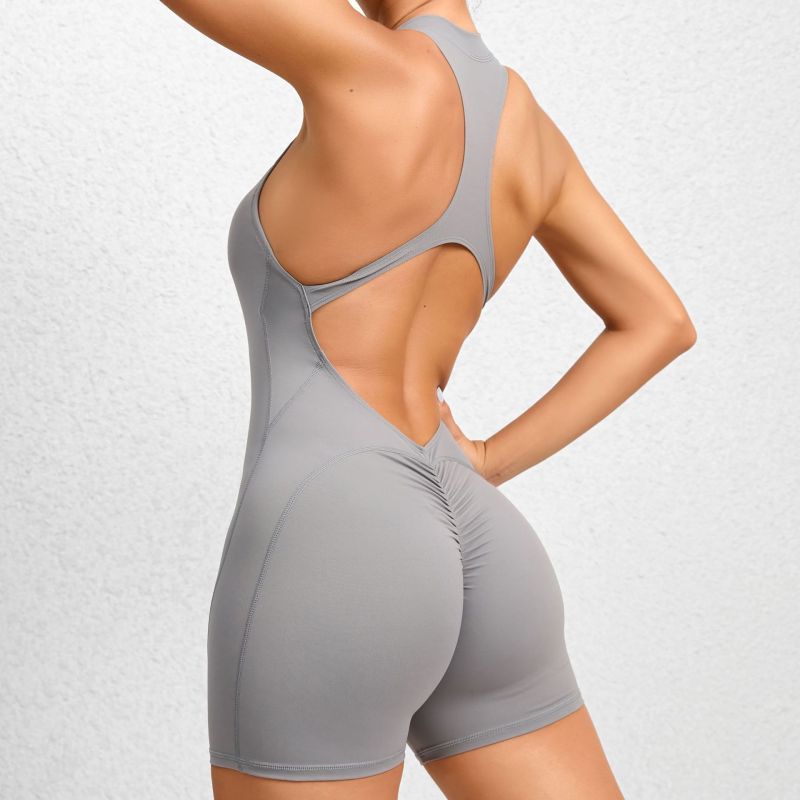 European and American tight-fitting zippered sports yoga pants with peach hips, one-piece quick-drying pleated fitness jumpsuit