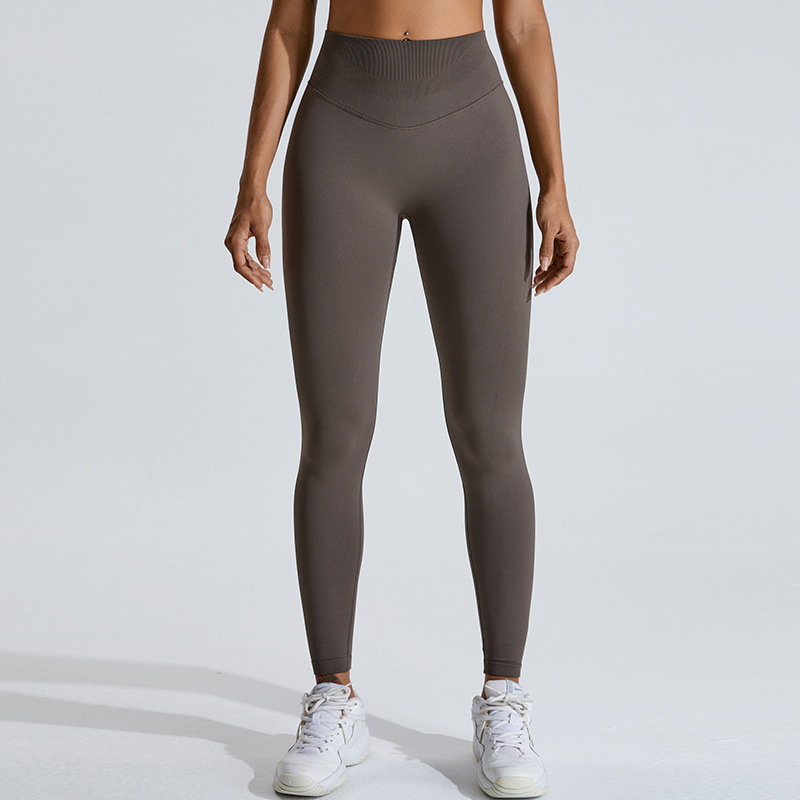 European and American seamless peach hip-lifting yoga pants women's V-curve high waist tights outdoor running sports fitness trousers